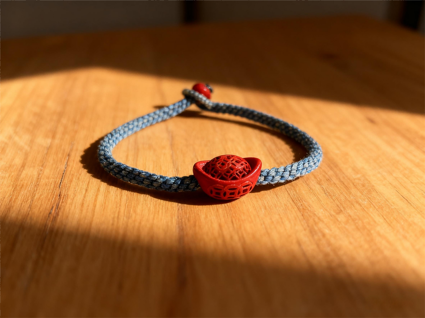 “Hand-Carved Cinnabar Ingot Bracelet – Denim Blue Red String Lucky Jewelry for Gen Z Trendsetters, Retro Eastern Symbol Accessory with Bold Color Clash”
