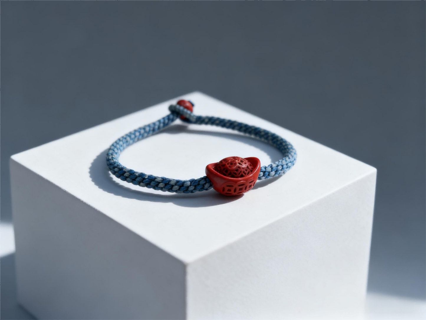 “Hand-Carved Cinnabar Ingot Bracelet – Denim Blue Red String Lucky Jewelry for Gen Z Trendsetters, Retro Eastern Symbol Accessory with Bold Color Clash”